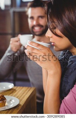 Group of friends enjoying a breakfast in a cafe