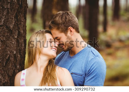 Young happy hiker couple in the nature