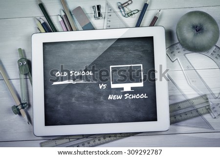 old school vs new school against blue chalkboard