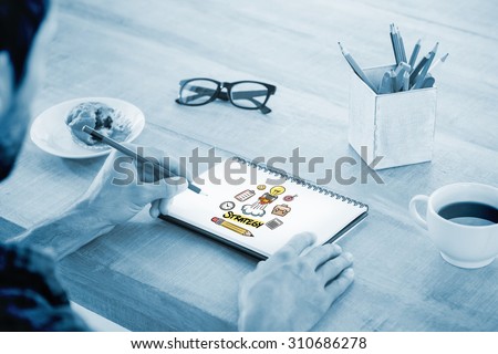 Creative businessman writing notes on notebook against strategy doodle