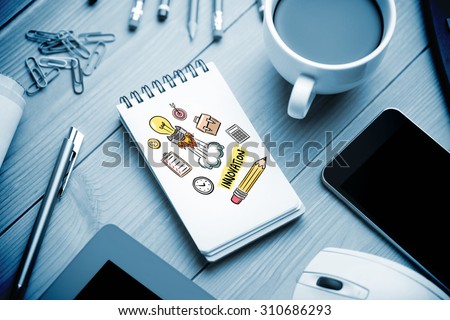 innovation doodle against notepad on desk