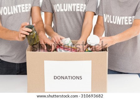 Volunteers sorting donations in the office