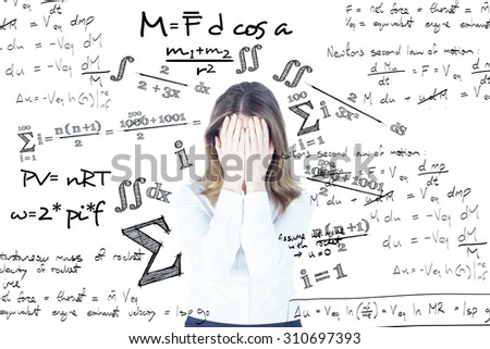 Anxious businesswoman with head in hands against maths equation