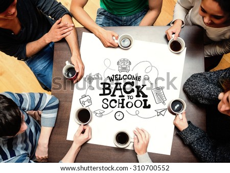 People sitting around table drinking coffee against back to school