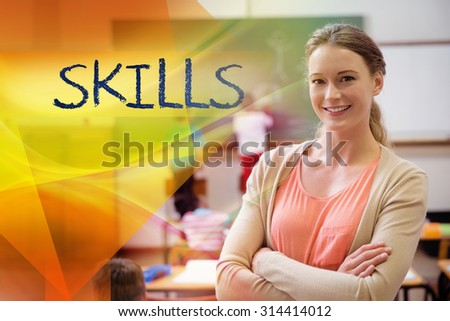 The word skills against pretty teacher smiling at camera at back of classroom
