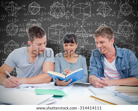 Two students getting help from a female student against black background