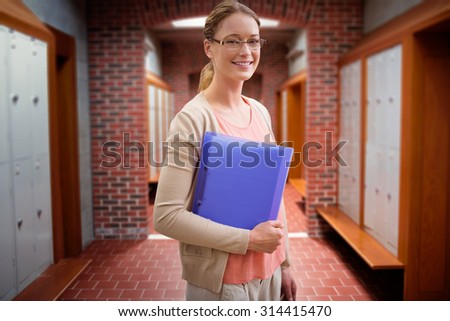 Teaching student against brick walled corridor with tiled flooring in college