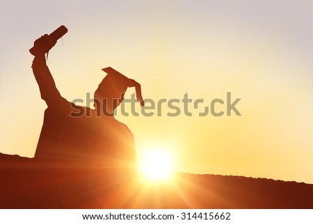 Silhouette of graduate against sun shining 商業照片 © 