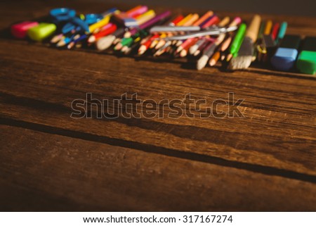 Art supplies on desk with copy space shot in studio