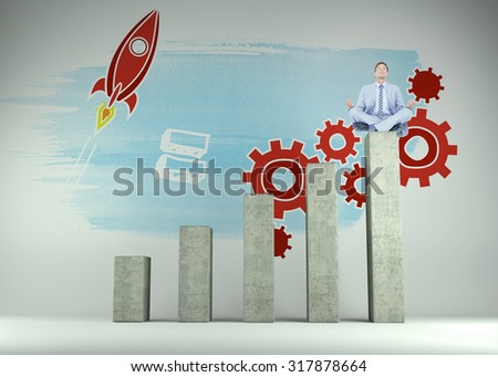 Calm businessman meditating in lotus pose against bar chart depicting growth