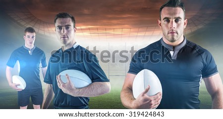 Rugby player holding a rugby ball against rugby pitch