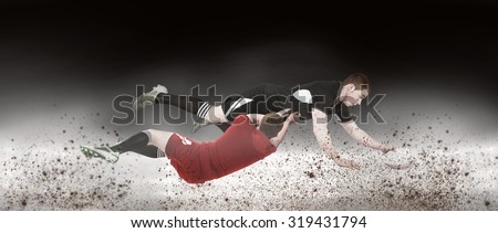 A rugby player scoring a try against spotlight
