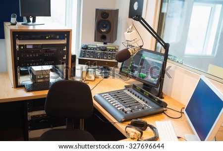 Modern equipment on desk in radio studio