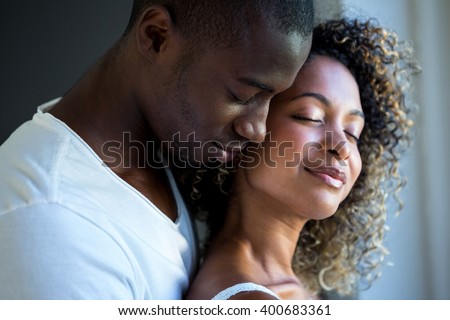 Similar – Image, Stock Photo Romantic black couple embracing on street