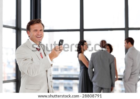 Potrait of a Senior business man on phone