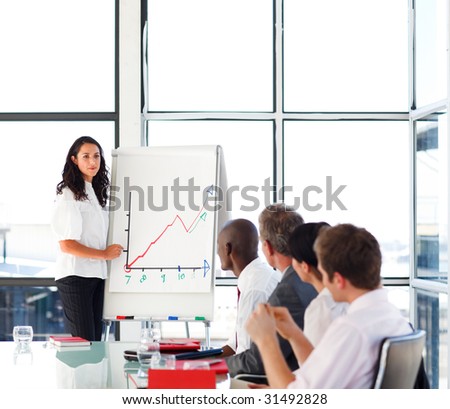 Businesswoman reporting sales figures to her international team