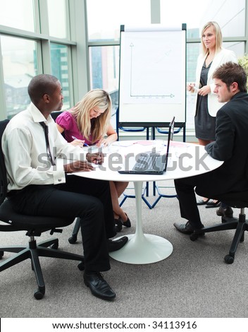 Multi-ethnic business people working together in a presentation