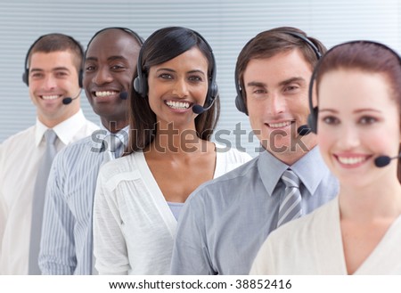 Indian businesswoman working in a call center standing in a line