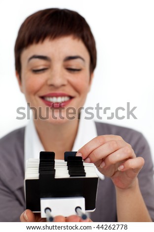 Young businesswoman searching for the index against a white background