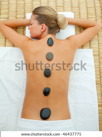 Blond Woman getting spa treatment in a health center