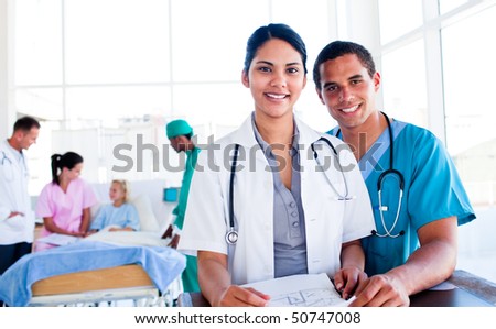 Smiling medical team at work in hospital
