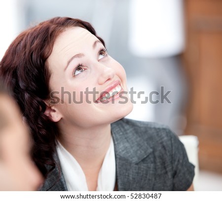 Portrait of a radiant businesswoman smiling at work