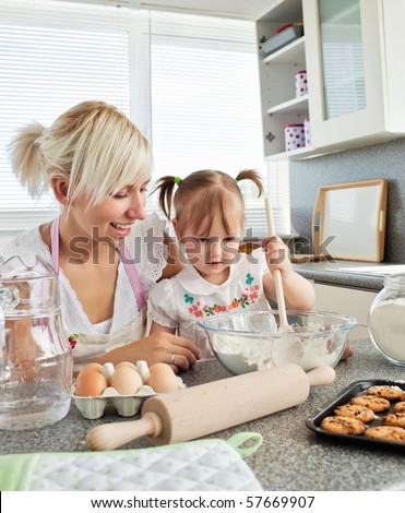 Sweet Girl Baking Cookies With Her Mother Stock Photo 57669907 ...