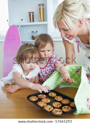 Happy family eating cookies