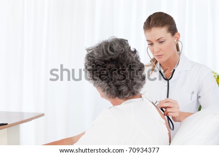 Nurse taking care of her patient