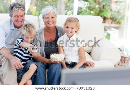Lovely family watching tv