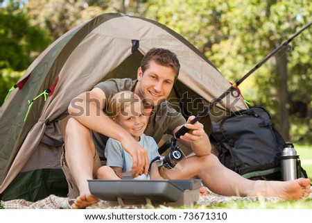 Father fishing with his son