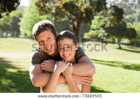 Man hugging his beautiful wife