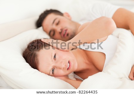 Woman not wanting to hear snoring in the bedroom