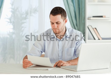 Similar – Image, Stock Photo Relaxed man reading notes in notebook