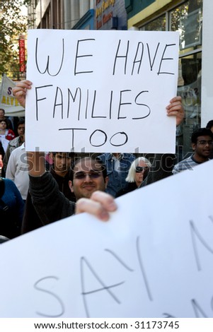 MELBOURNE - MAY 31 : Demonstrators hold placards at a rally against racism  towards Indian students May 31, 2009 in Melbourne, Australia.