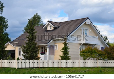new house with a garden in the countryside