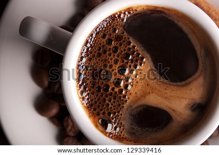 white coffee cup on background