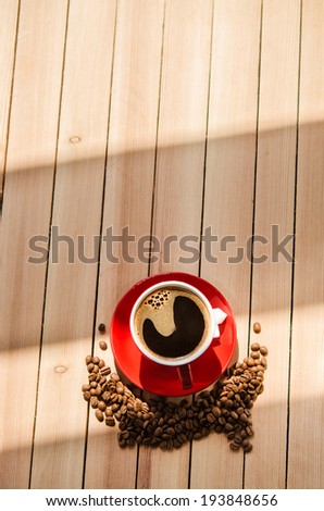 cup of coffee by the window in kitchen