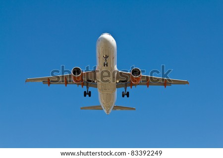 Under view of an airplane coming into land