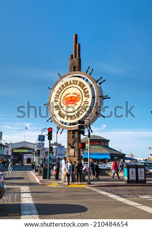SAN FRANCISCO - APRIL 24: Famous Fisherman\'s Wharf sign on April 24, 2014 in San Francisco, California. It\'s one of the busiest and well known tourist attractions in the western United States.