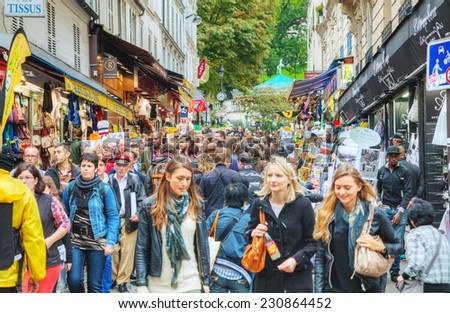 PARIS - OCTOBER 12: Rue de Steinkerque on Montmartre hill crowded with tourists on October 12, 2014 in Paris. It is 130 m high hill in the north of Paris and gives its name to the surrounding district