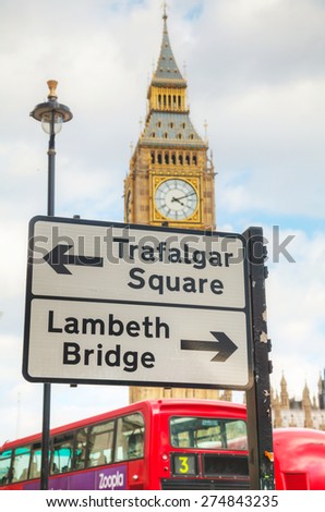 LONDON - APRIL 5: Street sign at the Parliament square in city of Westminster on April 5, 2015 in London, UK. It\'s a square at the northwest end of the Palace of Westminster in London.
