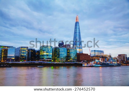 LONDON - APRIL 4: Overview of London with the Shard of Glass on April 4, 2015 in London, UK. Standing 306 metres high, the Shard is currently the tallest building in the European Union.