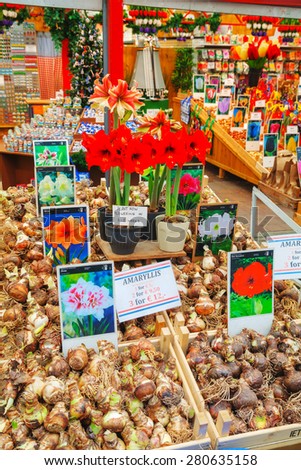 AMSTERDAM - APRIL 17: Boxes with bulbs at the Floating flower market  on April 17, 2015 in Amsterdam, Netherlands. It\'s usually billed as the  world\'s only floating flower market.