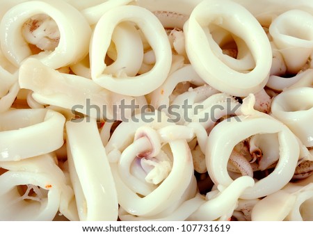 Cut raw calamari rings