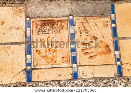 CANNES - JULY 05: Imprints of hands of famous people of cinema Roman Polanski and Jacques Deray, located on the famous \