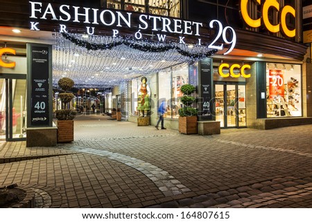 ZAKOPANE - NOVEMBER 17: Gateway to Fashion Street Krupowki 29, shopping avenue length of over 120 meters brings together 43 luxury boutiques in Zakopane, Poland November 17, 2013