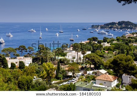 CAP FERRAT, FRANCE - MAY 28, 2012: Private Houses along the coast of Cap Ferrat, offers one of the most beautiful tourist destinations and one of the most expensive residential location in the world