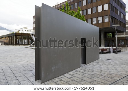 VADUZ, LIECHTENSTEIN - MAY 10, 2014: The Swiss Fountain, sculptural installation made of chrome-plated steel plates that works with water inside, by Swiss artist Roman Signer born in Appenzell, 1938