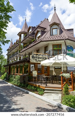 ZAKOPANE, POLAND - JUNE 27, 2014: Litwor Hotel, five-star hotel built in 1999, offers 51 luxurious rooms, located just off the Krupowki street, the main shopping and pedestrian promenade in the city